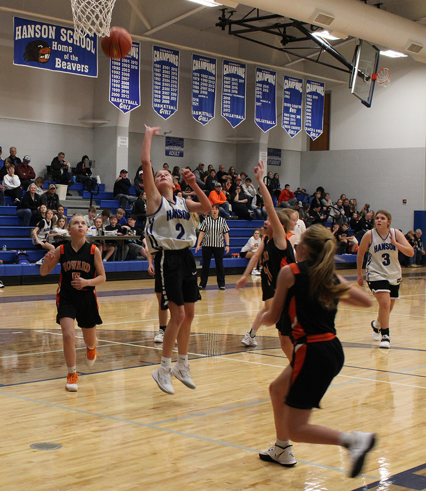Hanson seventh grader, Ava Doyle, puts up a shot in the lane against the Howard Tigers last week.